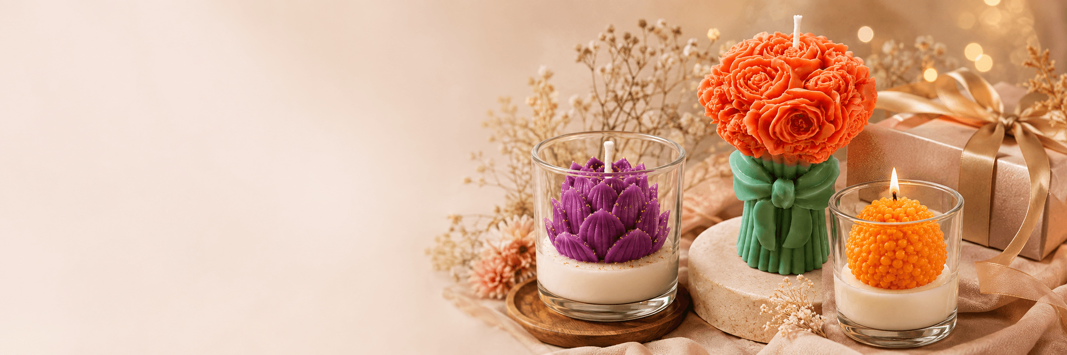 Seasonal Sparkle candles styled as an elegant gift collection